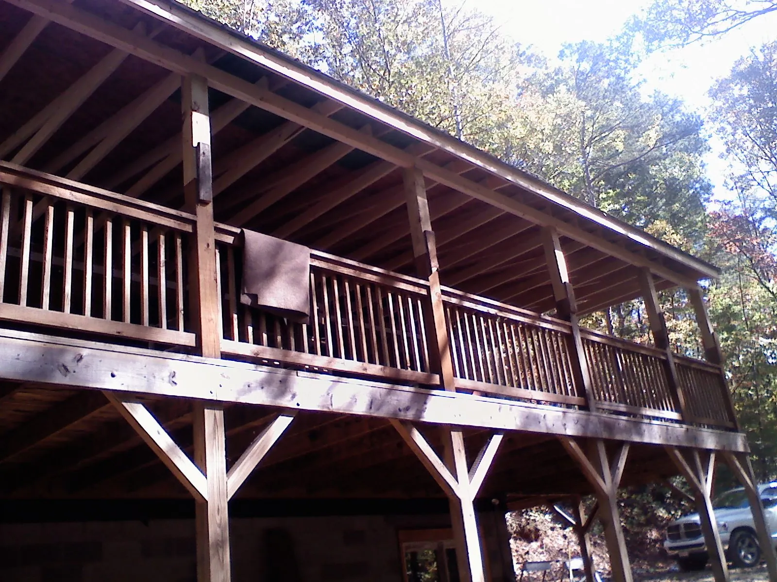 Timber framing under a new elevated porch and deck — Roof Leak Repair in Green Mountain Falls by Roofing Brothers